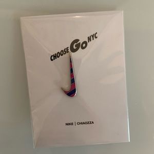 Nike striped enamel pin